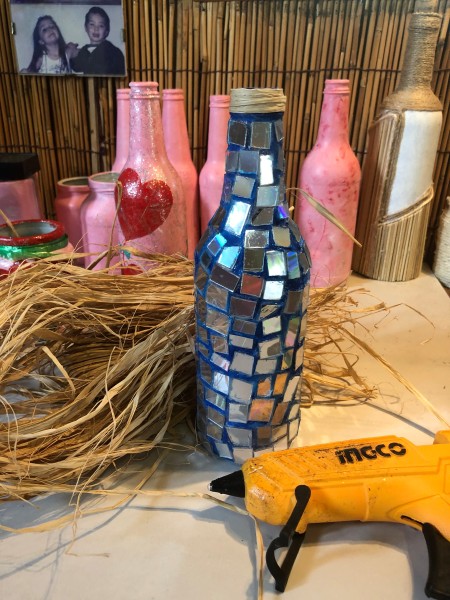 Mirrored Mosaic Flower Vase - raffia next to bottle