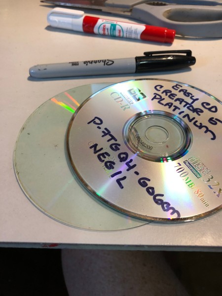 Making Feather Bookmarks from CDs - use second CD to create feather curves