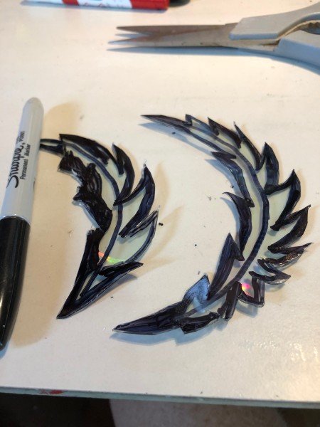 Making Feather Bookmarks from CDs - two feathers cut out