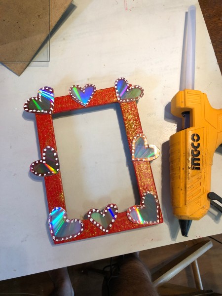 Valentine's Day Picture Frame - arrange the mirrored heart on the frame and glue in place