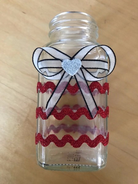 Heart Sticks Valentine's Day Arrangement - place a heart sticker over the center of the bow