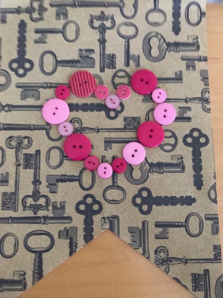 Valentine's Day Hanging Flag Banner - glue down buttons in the shape of a heart