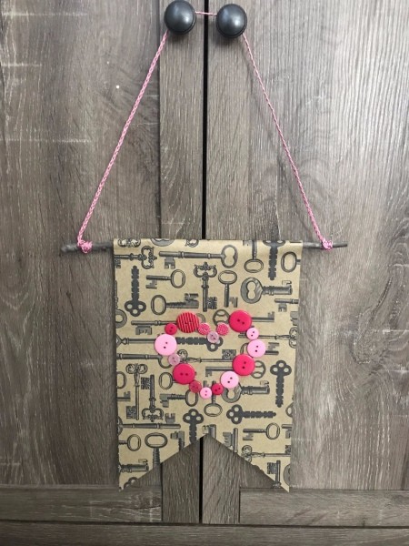Valentine's Day Hanging Flag Banner - banner hanging on cabinet knobs