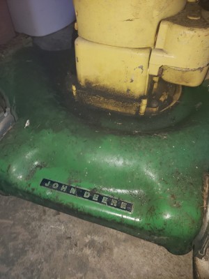 Value of a Vintage John Deere Mower - yellow and green gas mower