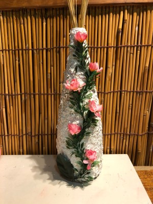 Recycled Eggshell Vase - finished vase with faux flowers glued to the front