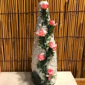 Recycled Eggshell Vase - finished vase with faux flowers glued to the front