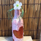 Recycled Snow and Heart Vase - finished vase with a flower and stems