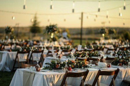A wedding reception with tablecloths.