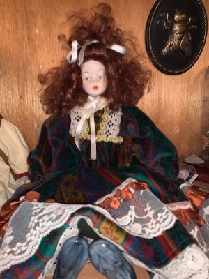 Identifying a Porcelain Doll - doll with curly auburn hair