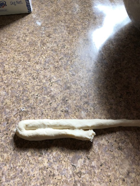 Homemade Air Dry Clay - pull it out into a string on a flat surface, if it sticks put back into the bowl and add a little more flour and continue checking