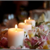 Candle centerpiece at a wedding.