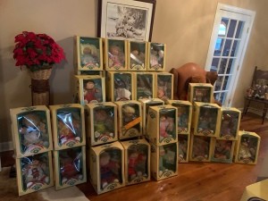 Selling Cabbage Patch Dolls - stacks of dolls in boxes