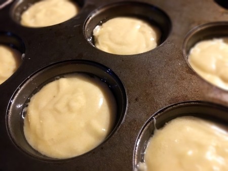 filling cupcake tin with batter