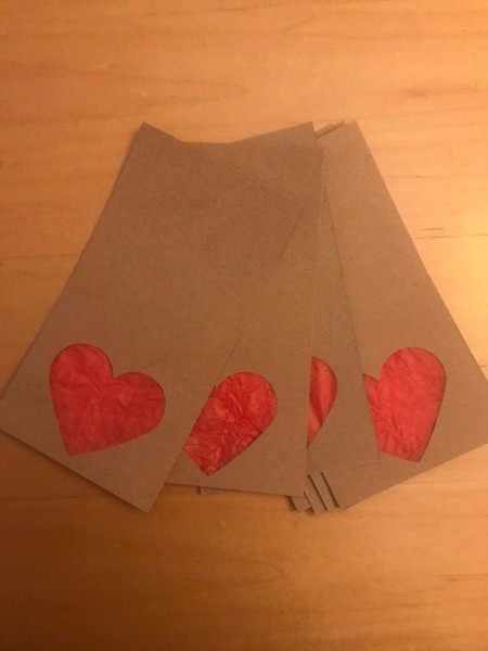 Simple Heart Garland - tissue glued to the back of the paper behind the heart cut out