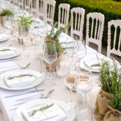 Wedding Table with live herbs in burlap as centerpieces.