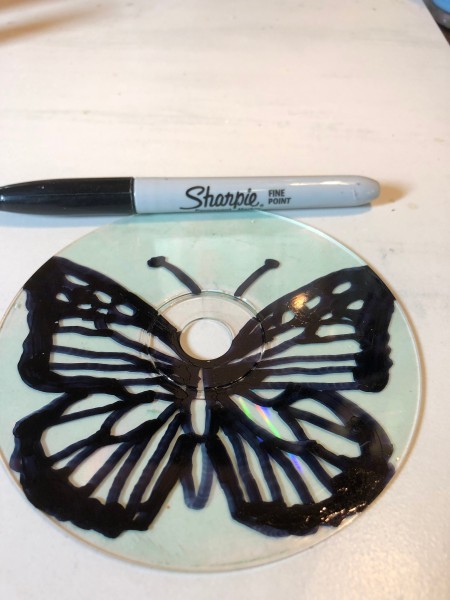 Golden Butterfly Suncatcher - using the marker draw the butterfly on the side of the CD that did not have label