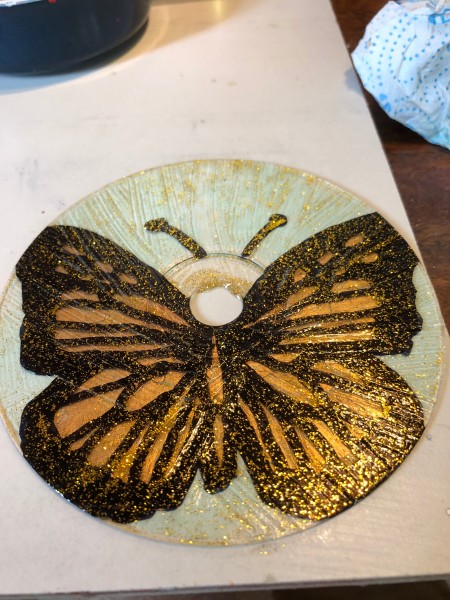 Golden Butterfly Suncatcher - add gold glitter glue to the front side where you drew the butterfly