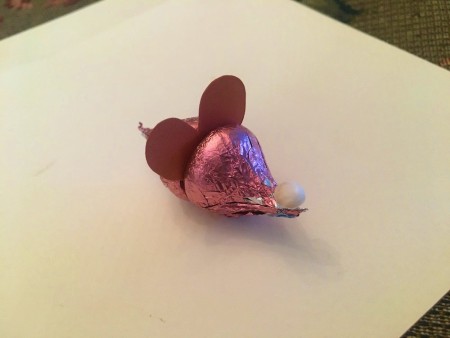 Making Hershey's Kiss Valentine Mice - roll a small piece of a cotton ball to make the nose and glue in place