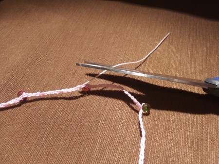 Crocheted Bead Necklace - use hook or a needle to weave in ends, cut off the excess