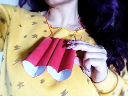 Heart-Shaped Toy Binoculars - woman wearing the binoculars around her neck