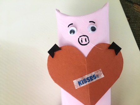 Hogs and Kisses Candy Holder - glue the hooves to the heart to look like the hog is holding it, cut the word KISSES from the candy tag and glue on the bottom of the heart, write Hogs + above it, fill with candy Kisses