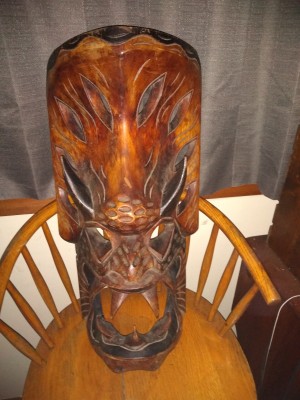 Identifying a Wooden Mask - mask on a chair