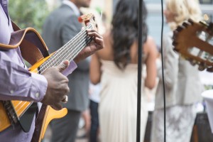 Guitarist playing at a wedding party.