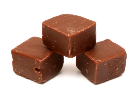 Squares of fudge on a white background.