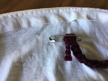 Making a Bag from a T-shirt - attach a safety pin to the end of the cord