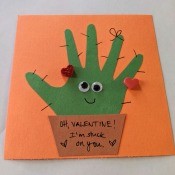 Valentine's Handprint Cactus Card - finished card with foam heart stickers added too