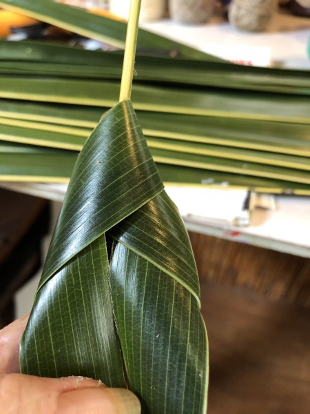 Making Woven Coconut Leaf Shrimp - continue alternating from right to left