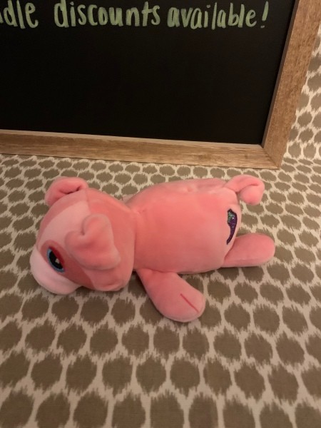 A pink stuffed toy.