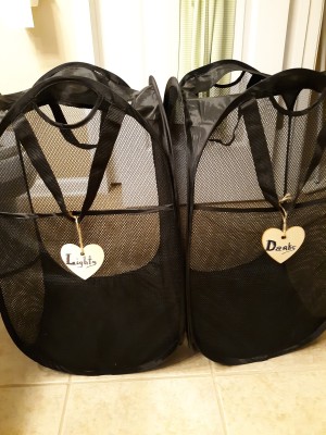 Two marked laundry hampers.