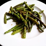 A plate of roasted green beans.