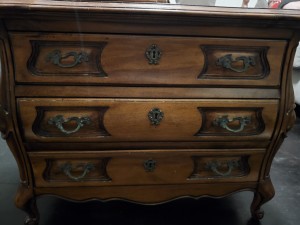 The front of a chest of drawers.