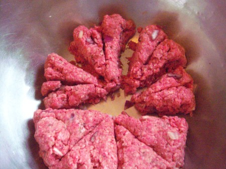 The individual pieces of divided hamburger.
