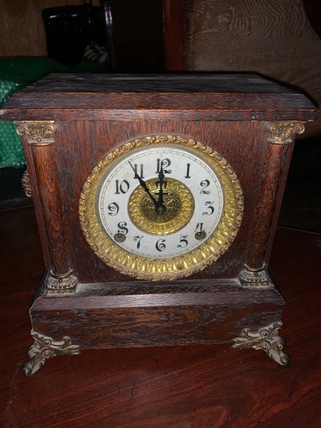 An antique desk clock.
