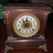 An antique desk clock.