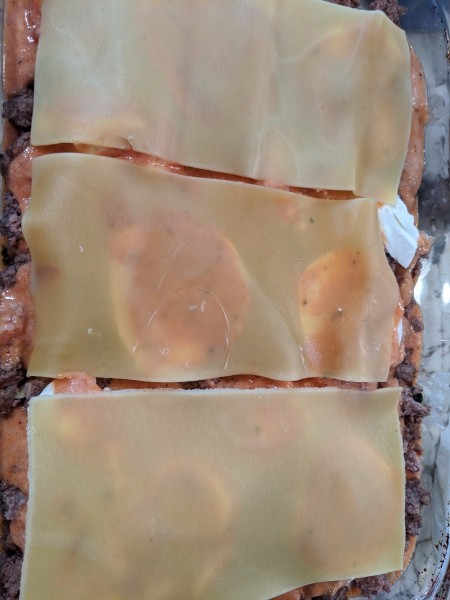 layer of Lasagna noodles in pan