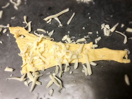 cheese on dough triangle