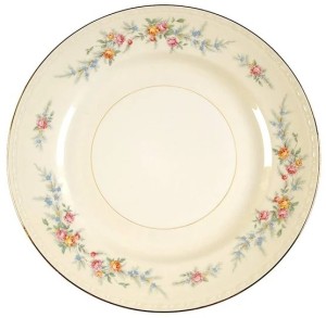 A Homer Laughlin plate with a flowered pattern.