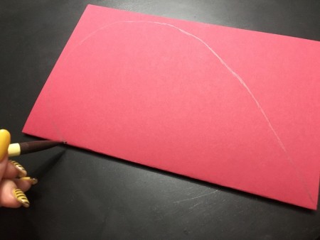 3D Pop-Up Heart Card - remove the white sheet and draw a half heart on the red paper at the fold