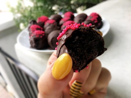 truffles on plate & in hand with bite out