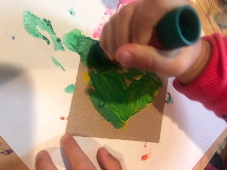 Handmade Valentine's Day Cards - adding color around a green heart with a marker
