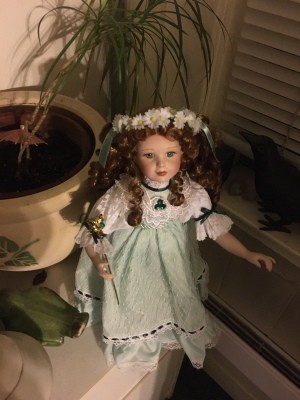 Value of Porcelain Dolls - doll wearing a green dress