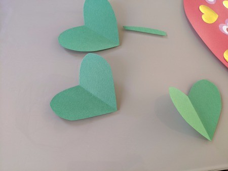 Giant Strawberry Valentine's Day Card - green paper heart shapes and a stem