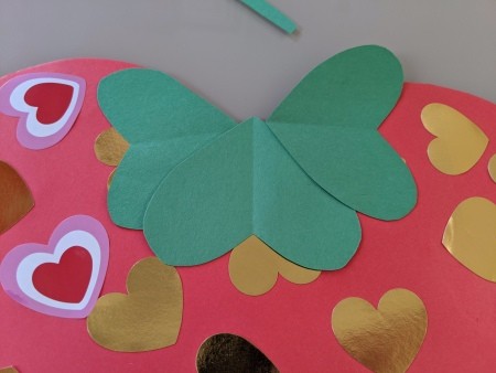 Giant Strawberry Valentine's Day Card - glue on the green hearts as leaves at the top of the berry