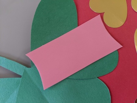 Giant Strawberry Valentine's Day Card - pink cardboard cut with concave ends on a rectangular shape