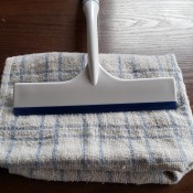 Window Cleaning Tip For an RV - squeegee and a towel