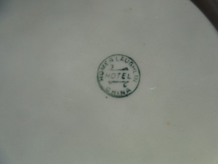 A marking on the back of a plate.